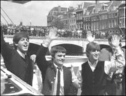 The Beatle arrive in Denmark on their 1964 European tour. Left to right: Paul McCartney, Jimmy Nicol (temporarily replacing Ringo Starr), John Lennon and George Harrison.