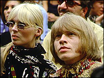 Brian Jones and model, Nico (left), in the audience at the Monterey Pop Festival, circa 1967.