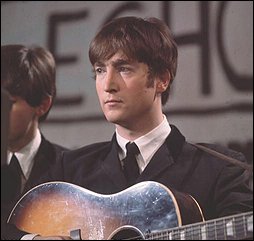 John Lennon during a BBC television show in 1963.