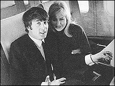 John Lennon and his wife, Cynthia, in happier days. They are on a plane to Miami during the Beatles first US visit in February 1964.