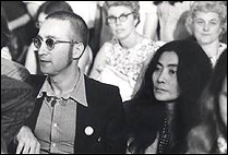 John Lennon and Yoko Ono attend the Watergate hearings.