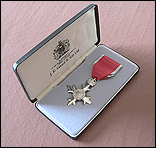 The MBE: Membership of the Most Excellent Order of the British Empire.