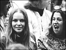 Michelle Phillips and Cass Elliot of The Mamas and The Papas in the audience at the Monterey Pop Festival in 1967.