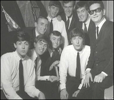 The Beatles on tour with Roy Orbison and Gerry and the Pacemakers in 1963.
