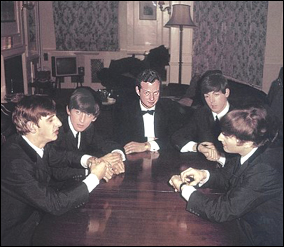 The Beatles with their manager, circa 1963. Left to right: Ringo Starr, George Harrison, Brian Epstein, Paul McCartney, and John Lennon.