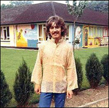 George Harrison in front of his Esher bungalow sometime in 1967. It was here where the Beatles taped the demos of the songs they wrote while in India.