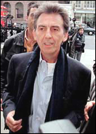 George Harrison testifies in court about the controversial Beatles Star-Club tapes. As usual, George's comments are laced with his laconic wit and dry humor.