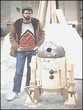 George Lucas with the Star Wars robot character, R2D2.