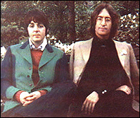 Paul McCartney and John Lennon pose for a photo during their trip to New York to promote Apple in 1968.